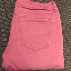 pink skinny jeans. never worn